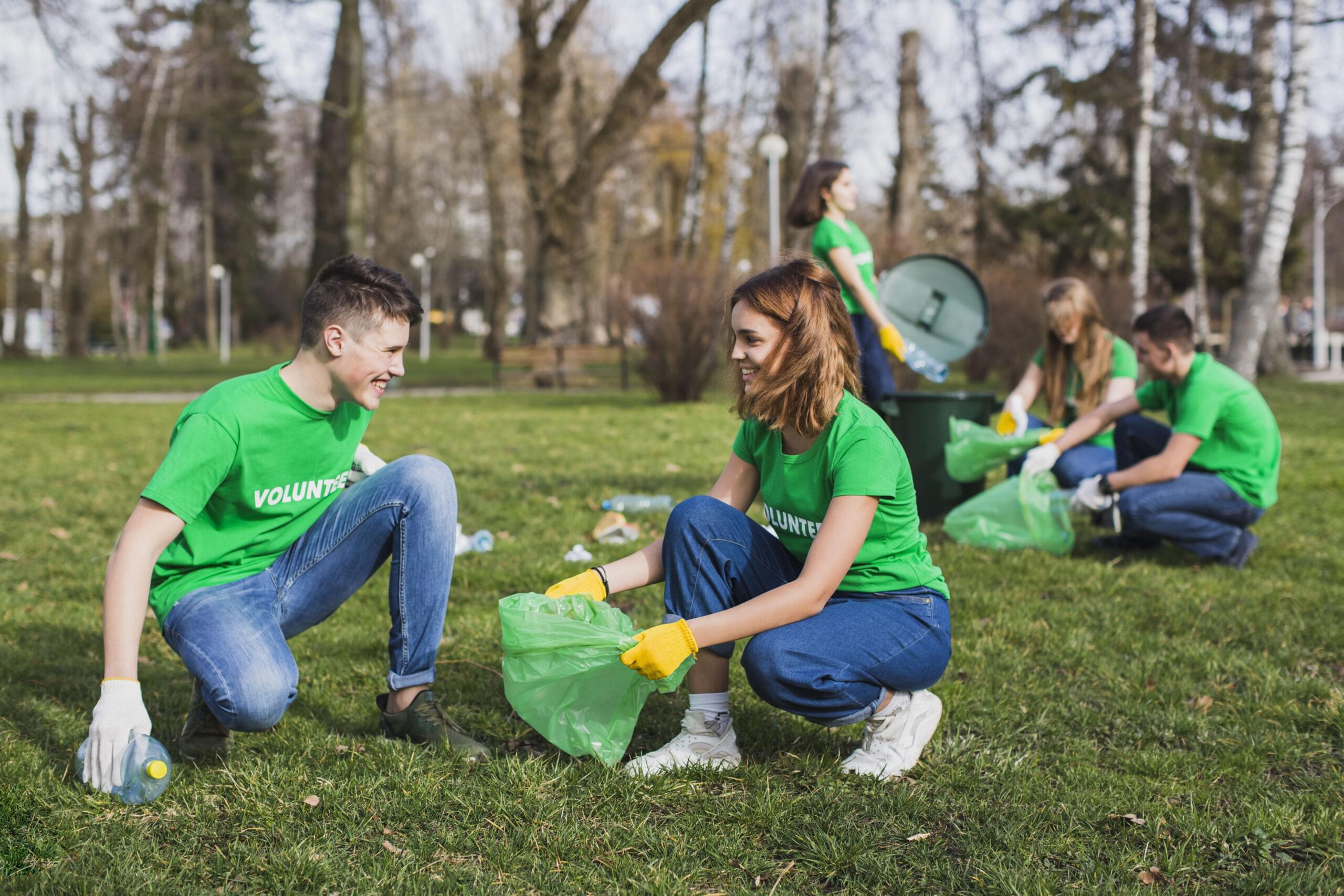 group-volunteers-with-garbage-bag